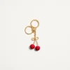 Chez Valentino Metal And Enamel Bag Charm With Key Ring