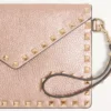Rockstud Laminated Grainy Calfskin Clutch Bag Rockstud Laminated Grainy Calfskin Clutch Bag
