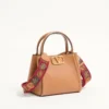 Valentino Garavani Alltime small handbag in grainy calfskin with embroidered ribbon shoulder strap