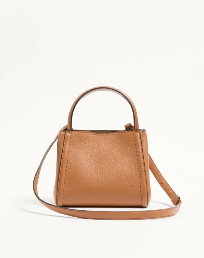 Valentino Garavani Alltime small handbag in grainy calfskin with embroidered ribbon shoulder strap