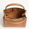 Valentino Garavani Alltime small handbag in grainy calfskin with embroidered ribbon shoulder strap