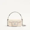 Valentino Garavani Locò Small Shoulder Bag With Jewel Logo Valentino Garavani Locò Small Shoulder Bag With Jewel Logo